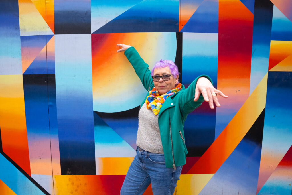 Flamboyant lady with abstract artwork